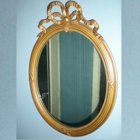 mirror-in-gold-leaf-oval-frame-antique-with-bow-19th-century