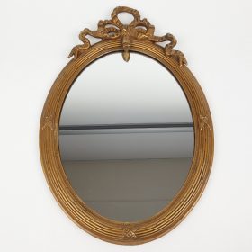 mirror-in-gold-leaf-oval-frame-antique-with-bow-19th-century